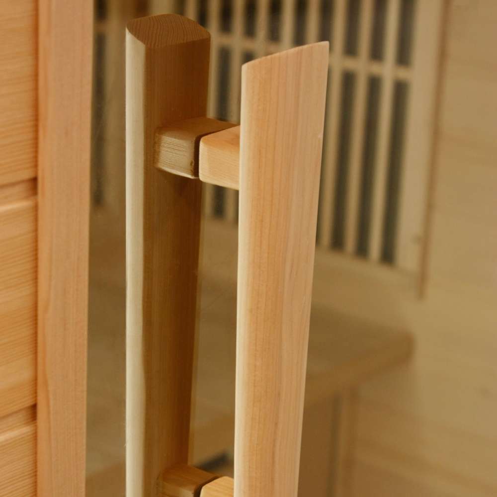 Close-up of the vertical wood door handle on the glass door of Golden Designs Maxxus Avignon 3 Person Corner Near Zero EMF Far Infrared Sauna in Red Cedar