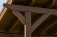 Close-up of wooden beams and braces on the Brookside Timber Frame Ridgeview Pavilion roof