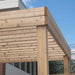 Close-up of wooden beams and joints on the Outdoor Living Today Western Red Cedar Urban Escape Pergola