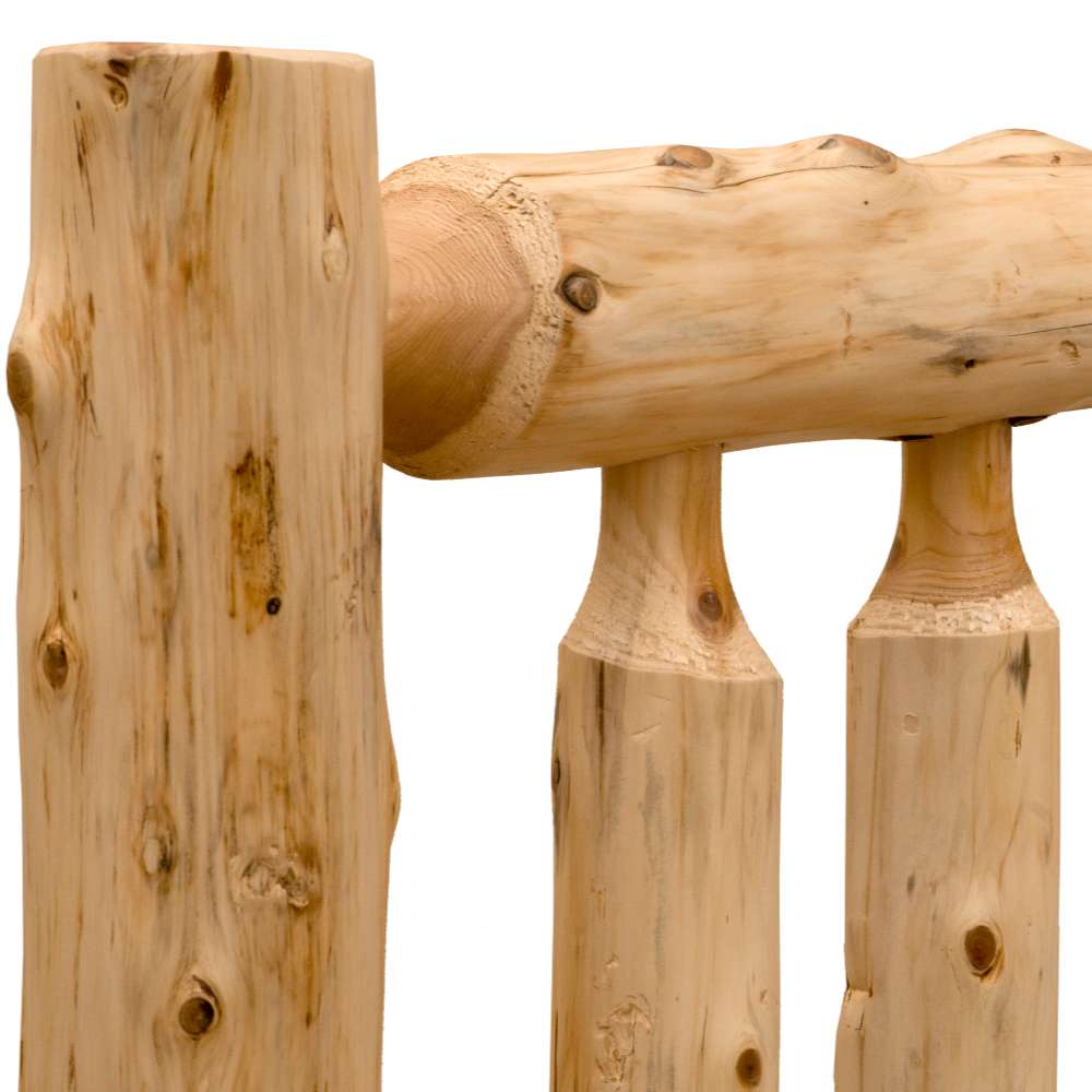 Close-up view of Fireside Lodge Cedar Log Traditional Bed shows thick, rounded cedar posts and natural wood grain with knots