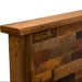 Close-up view ofheadboard corner shows the Fireside Lodge Barnwood Americana Bed made from thick, rustic barnwood