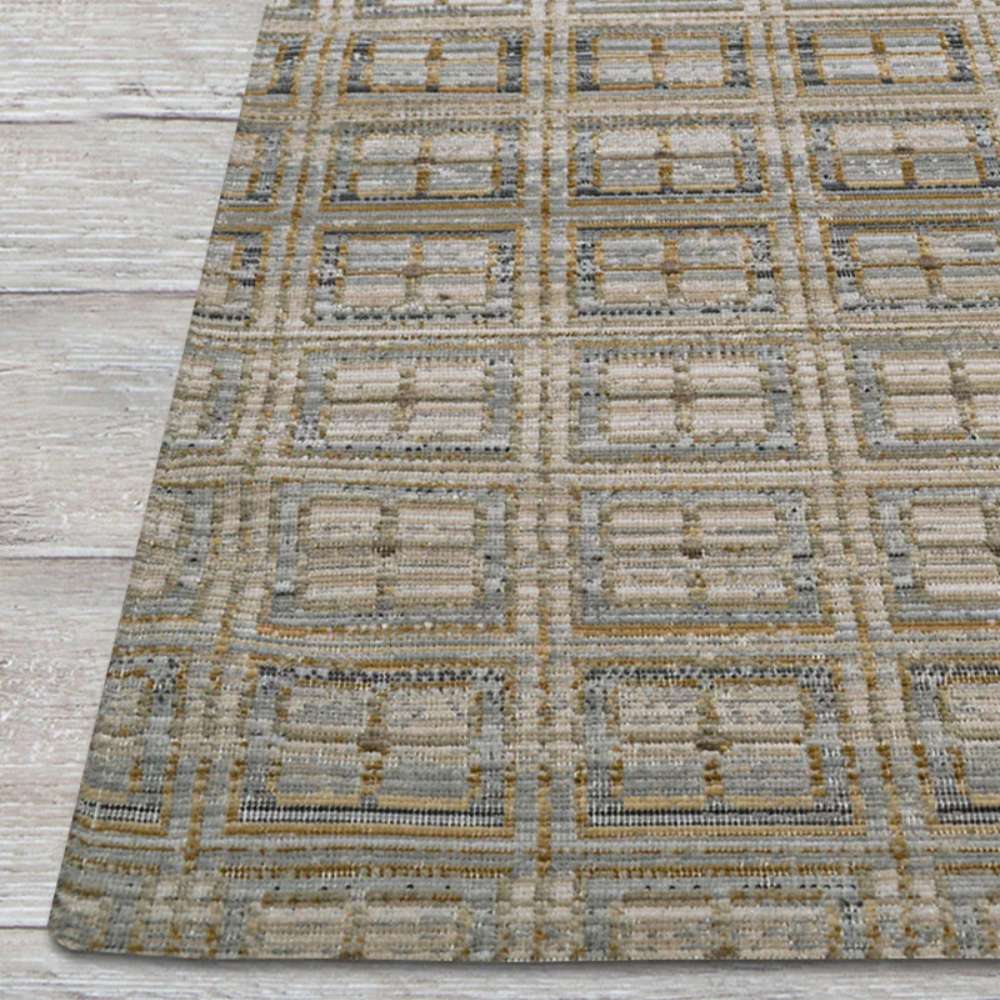 Close-up angled view of Couristan Fez Indoor/Outdoor Rug - Sidi/Sunlight shows its detailed rectangular grid pattern in soft earth tones
