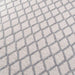 Close-up detail of Momeni Andes Indoor Rug - AND-7 Natural shows its textured weave and raised gray lattice design
