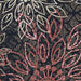 Close-up of Couristan Dolce Indoor/Outdoor Rug - Amalfi/Multi focuses on the red and ivory overlapping petals that form a blooming floral pattern