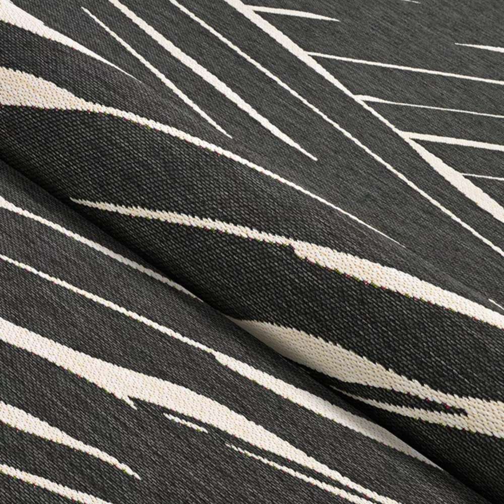Close-up of Couristan Dolce Indoor/Outdoor Rug - Parquet/Charcoal shows the texture and diagonal stripe detail of the fabric