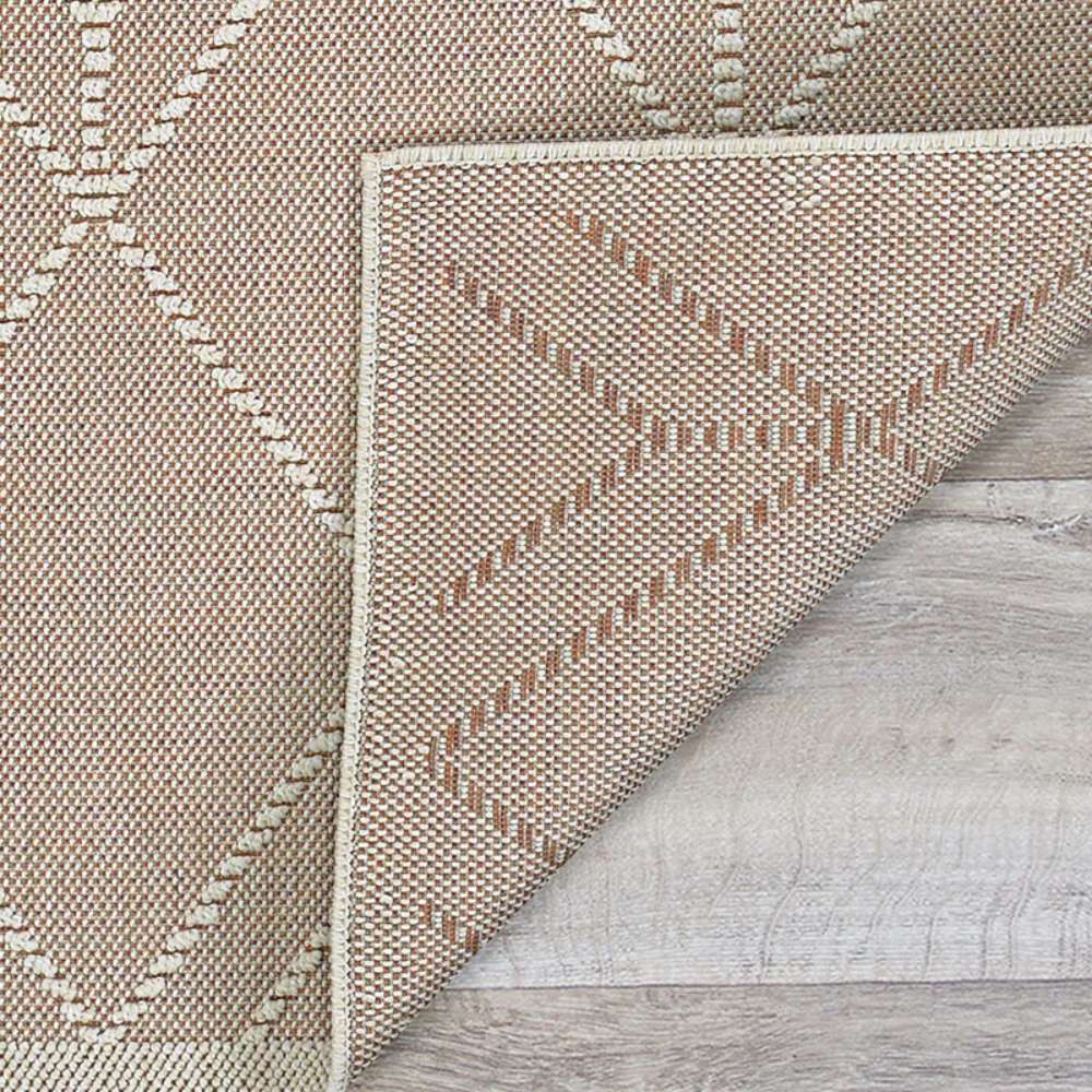Close-up of Couristan Liguria Indoor/Outdoor Rug - Noli/Umber shows its tightly woven texture with ivory geometric lines on a brown base