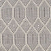 Close-up of Couristan Liguria Indoor/Outdoor Rug - Rapallo/Pebble shows detailed diamond shapes and pebble-colored texture against ivory