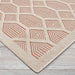 Close-up of Couristan Liguria Indoor/Outdoor Rug - Rapallo/Umber displays its textured surface and neat ivory border