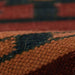 Close-up of Momeni Adobe Indoor Rug - ADO-2 Multi reveals its rich wool texture and intricate color detailing in earthy tones