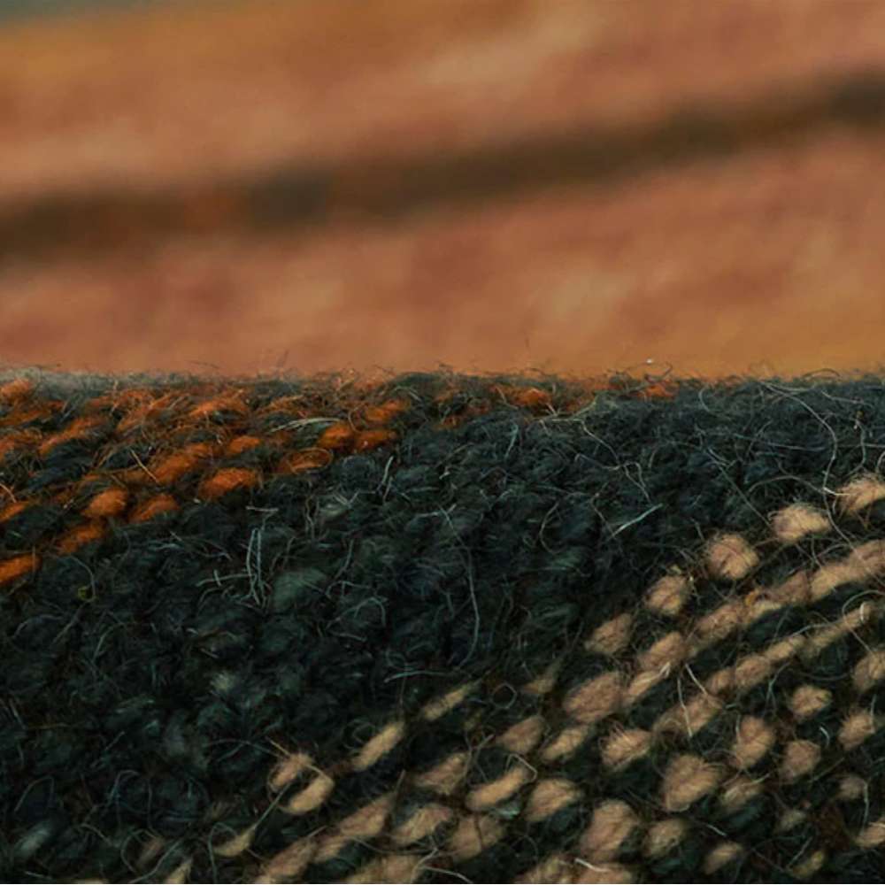 Close-up of Momeni Adobe Indoor Rug - ADO-3 Blue highlights its thick woven texture and rich color detailing