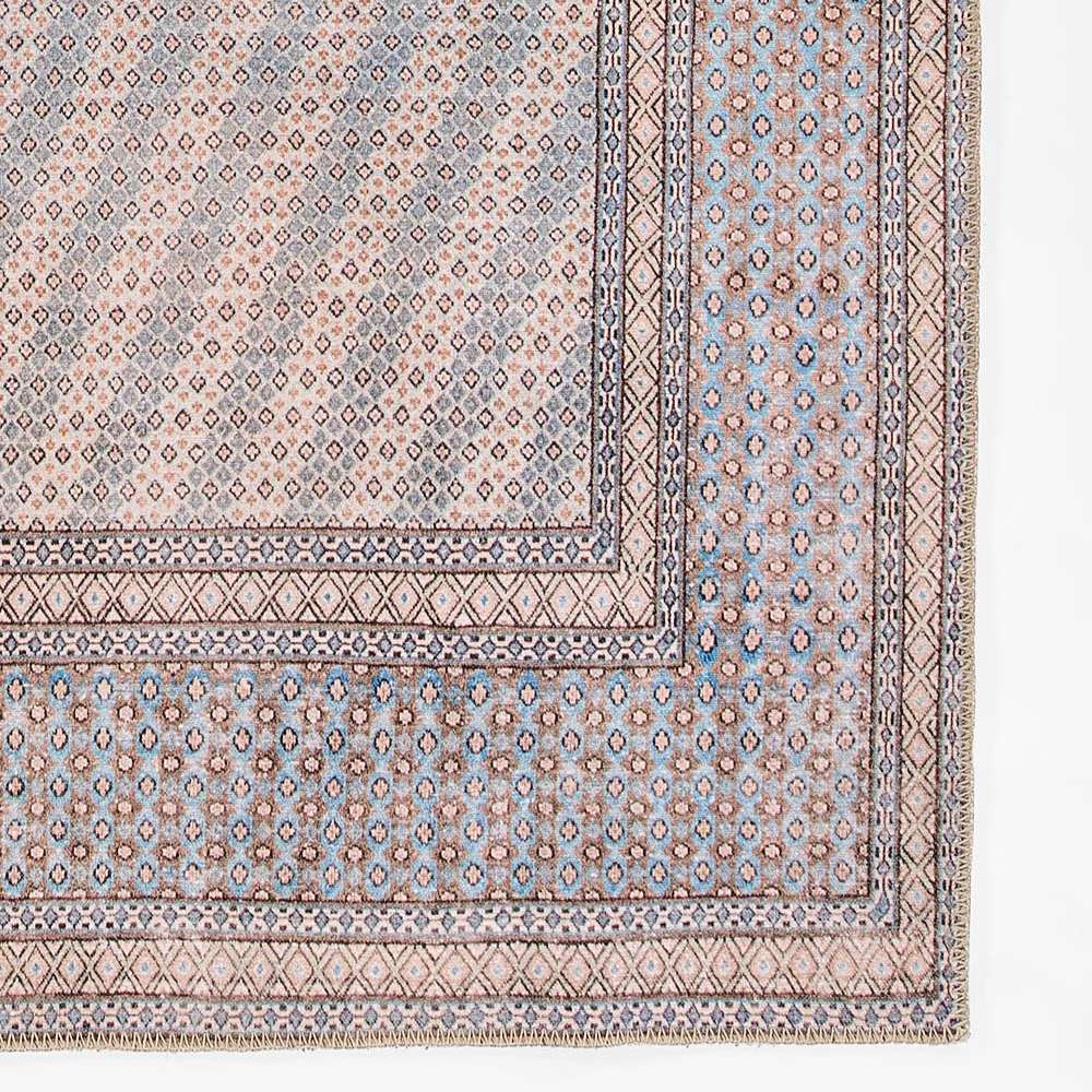 Close-up of Momeni Afshar Indoor Rug - AFS34 Blue highlights its detailed border patterns and textured weave in blue and earthy hues