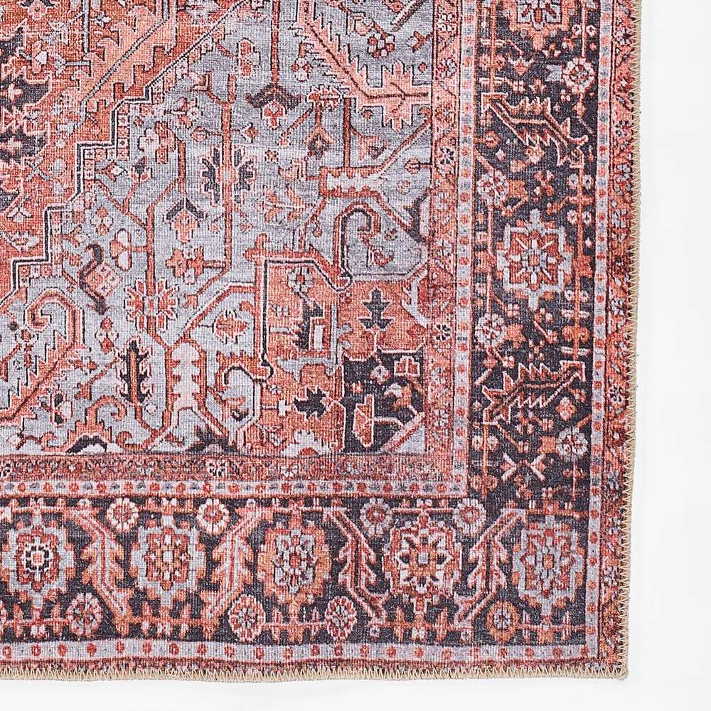 Close-up of Momeni Afshar Indoor Rug - AFS36 Copper highlights its intricate border patterns and detailed floral motifs in copper and dark hues