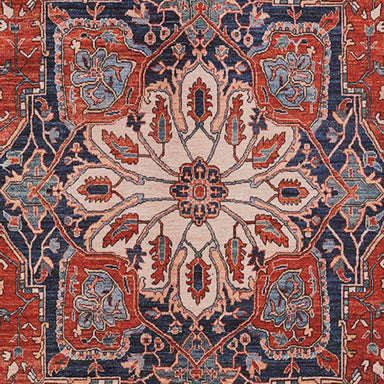 Close-up of Momeni Afshar Indoor Rug - AFS37 Red reveals its ornate medallion centerpiece in vibrant red and blue hues