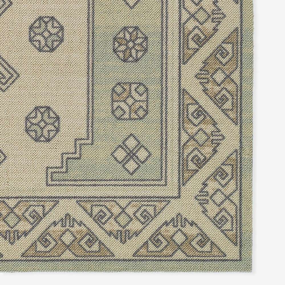 Close-up of Momeni Anatolia Indoor Rug - ANA-11 Sage highlights its detailed corner border with intricate geometric patterns