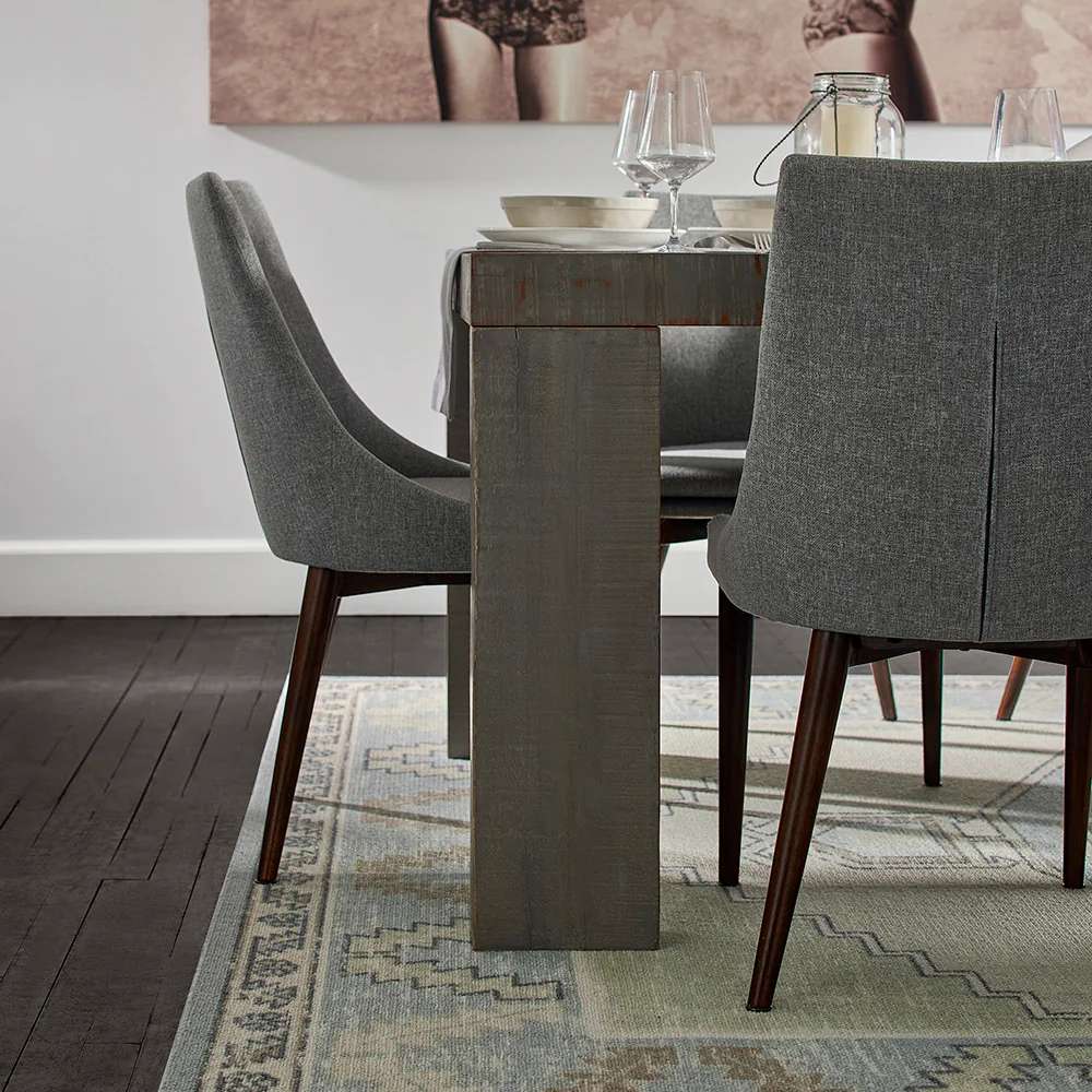 Close-up of Momeni Anatolia Indoor Rug - ANA-2 Light Blue beneath a dining table