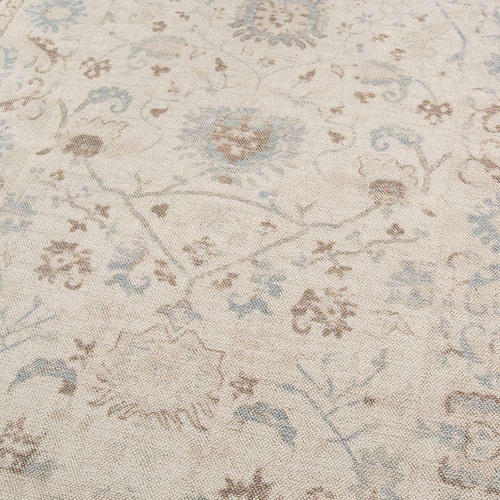Close-up of Momeni Anatolia Indoor Rug - ANA-5 Beige, showing its soft beige background with delicate floral and vine patterns in muted tones