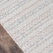 Close-up of Momeni Andes Indoor Rug - AND-4 Light Grey highlights its tightly woven braided pattern