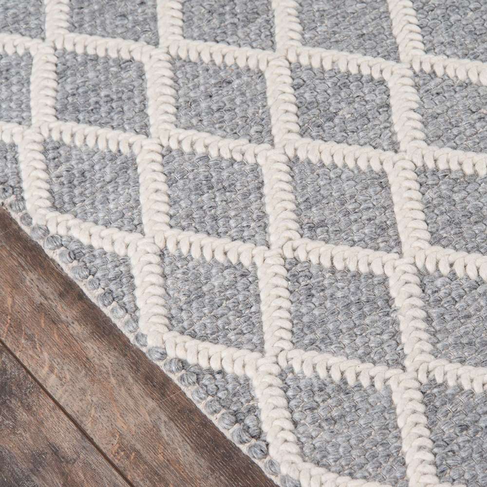 Close-up of Momeni Andes Indoor Rug - AND-7 Grey shows its thick woven texture with raised ivory diamond outlines on a grey base