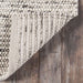Close-up of Momeni Andes Indoor Rug - AND-8 Ivory showing its thick, handwoven wool texture with ivory and gray tones