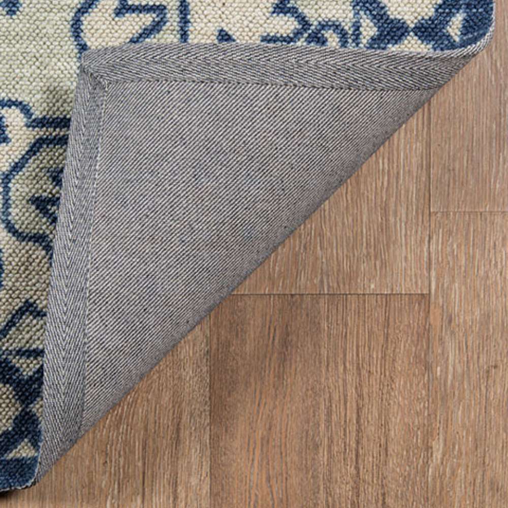 Close-up of corner backing shows the durable underside of the Momeni Anatolia Indoor Rug - ANA-3 Navy