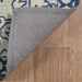 Close-up of corner backing shows the durable underside of the Momeni Anatolia Indoor Rug - ANA-3 Navy