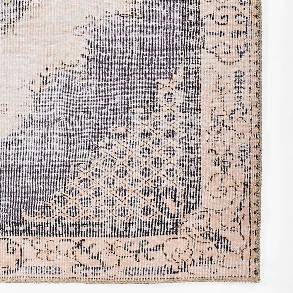 Close-up of the corner highlights the detailed border patterns of Momeni Afshar Indoor Rug - AFS35 Denim