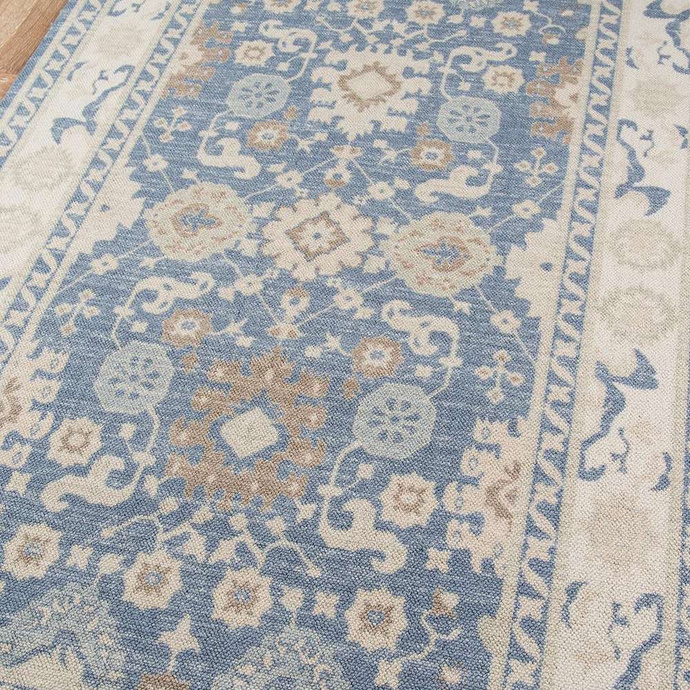 Close-up of the detailed floral and geometric patterns on Momeni Anatolia Indoor Rug - ANA-7 Light Blue