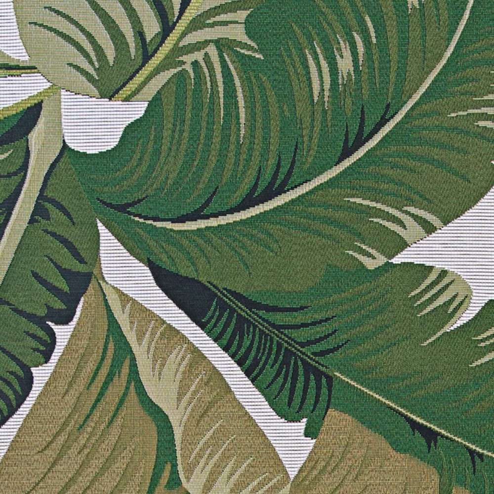 Close-up of the leaf pattern on Couristan Dolce Indoor/Outdoor Rug - Palm Lily/Hunter Green-Ivory shows intricate design and rich green tones
