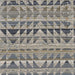 Close-up overhead shot reveals the geometric triangle and diamond pattern of Couristan Fez Indoor/Outdoor Rug - Souk/Earthen