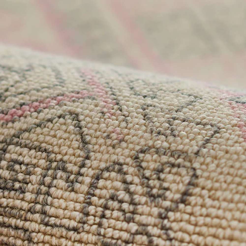 Close-up texture of Momeni Anatolia Indoor Rug - ANA-10 Pink showing the woven fibers and detailed stitching