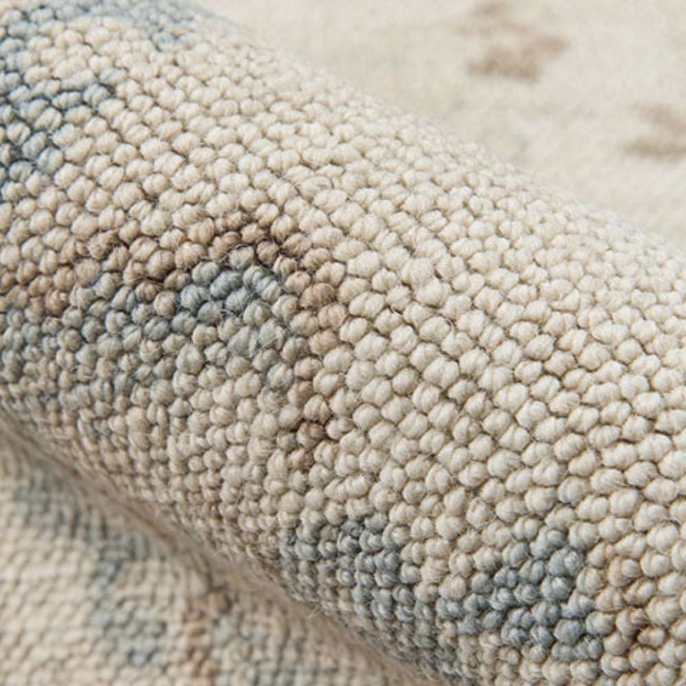 Close-up texture of Momeni Anatolia Indoor Rug - ANA-5 Beige reveals its plush woven loops and soft, durable finish