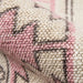 Close-up view highlights the woven texture and soft pastel tones of Momeni Anatolia Indoor Rug - ANA-2 Pink