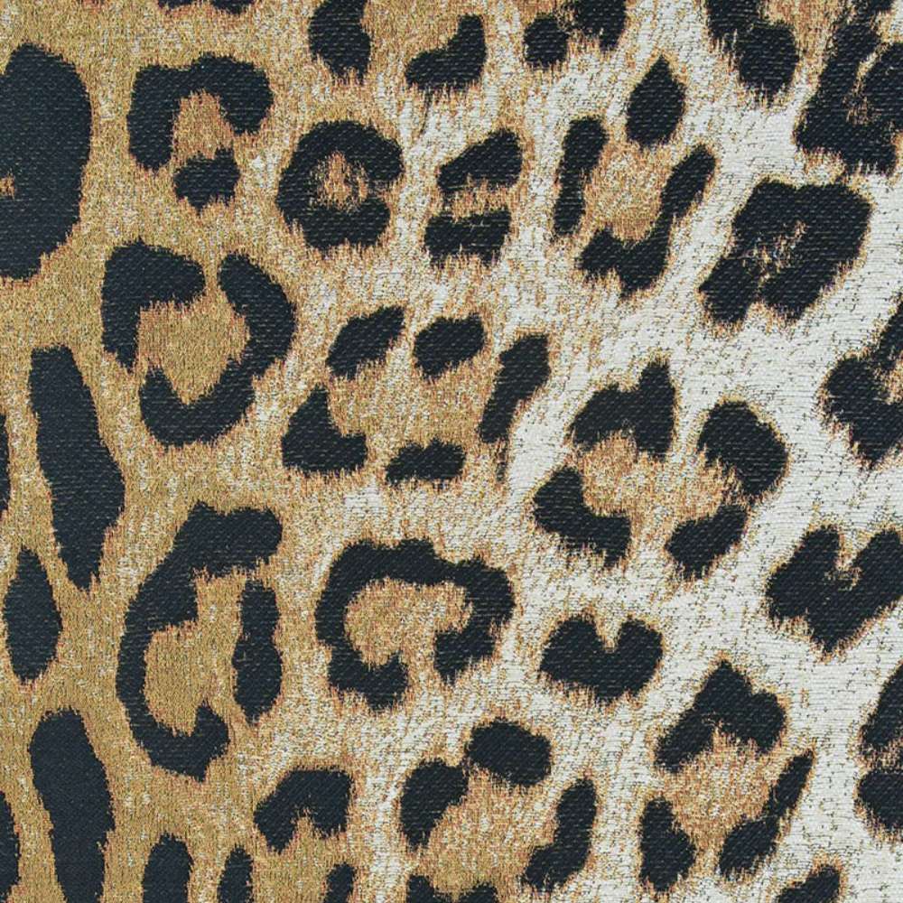 Close-up view of Couristan Dolce Indoor/Outdoor Rug - Amur Leopard/New Gold shows a dense field of black spots on a fading gradient of golden tan and ivory