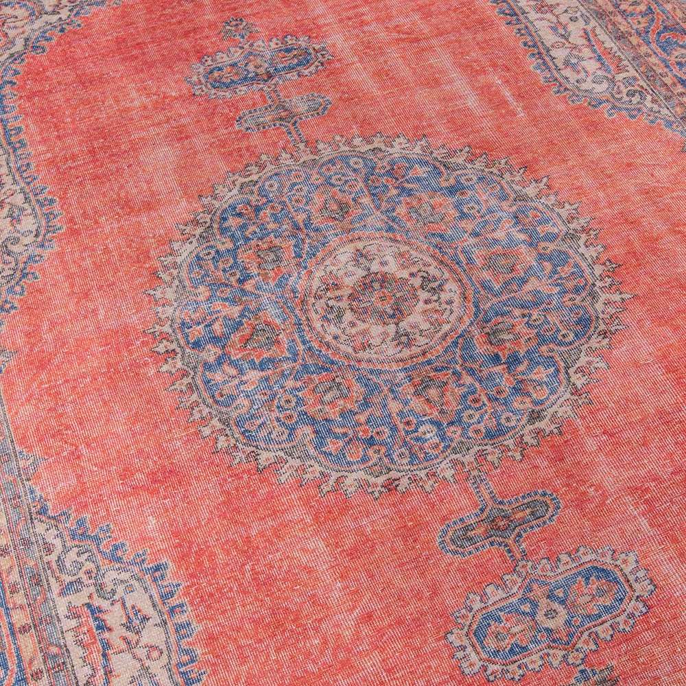 Close-up view of the ornate center medallion design on Momeni Afshar Indoor Rug - AFS12 Red