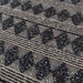 Close-up view of the textured diamond pattern on Momeni Andes Indoor Rug - AND-1 Charcoal