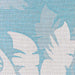 Close-up view showcases the tropical leaf design on Couristan Monaco Indoor/Outdoor Rug - Coastal Flora/Ivory-Turquoise