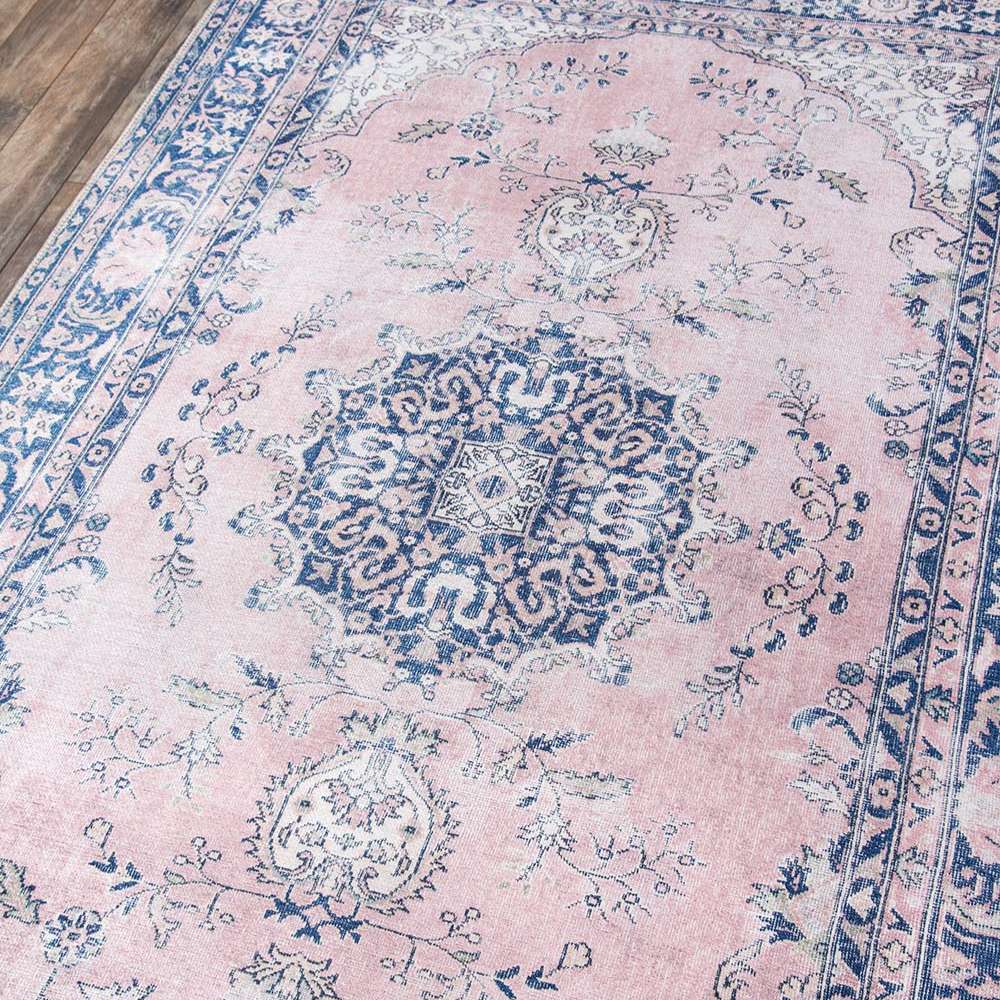 Close-up view shows the detailed floral medallion design of Momeni Afshar Indoor Rug - AFS30 Pink