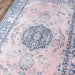 Close-up view shows the detailed floral medallion design of Momeni Afshar Indoor Rug - AFS30 Pink