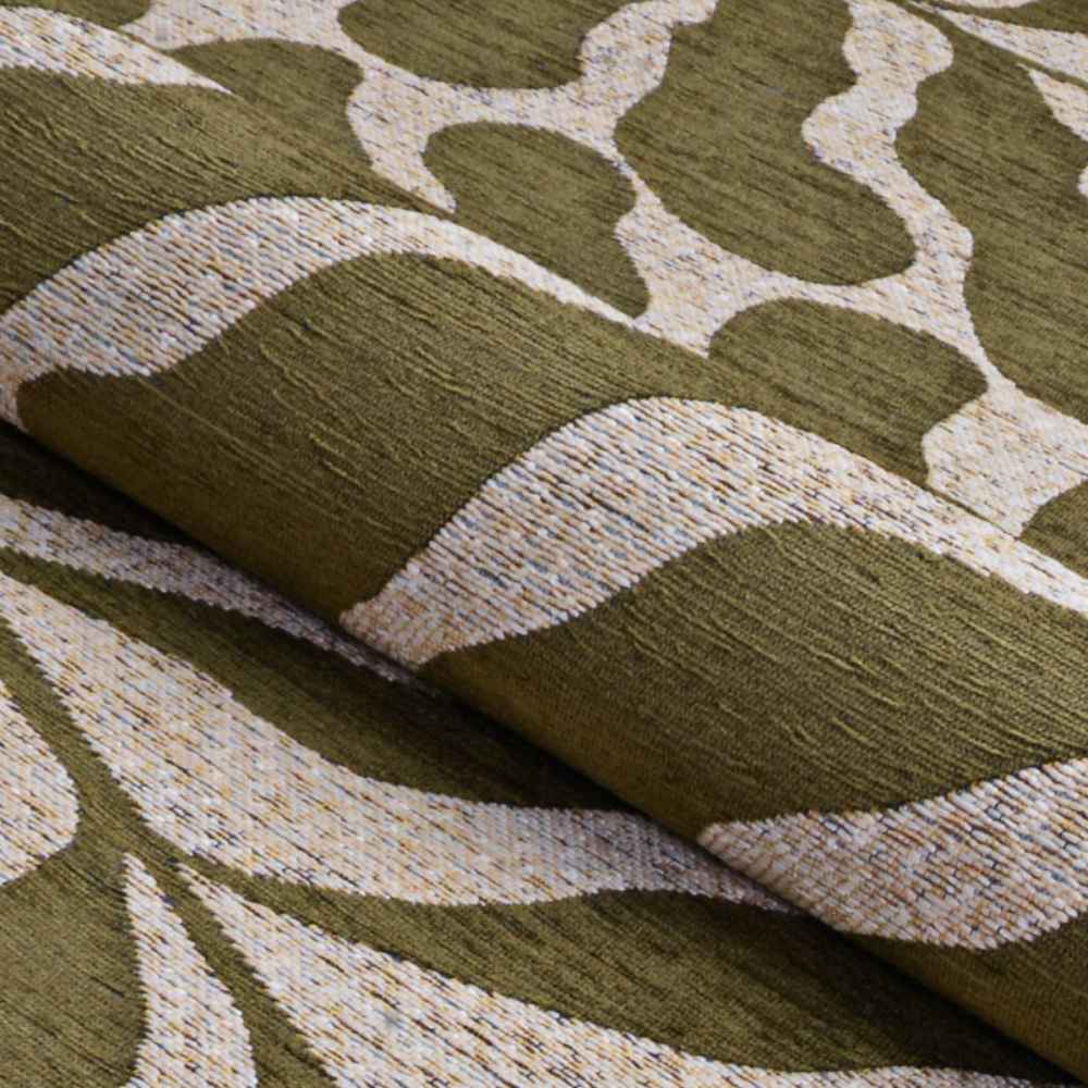 Close-up of the Couristan Castille Indoor/Outdoor Rug - Fiore/Tea Leaf highlights its textured surface with flowing beige and green patterns