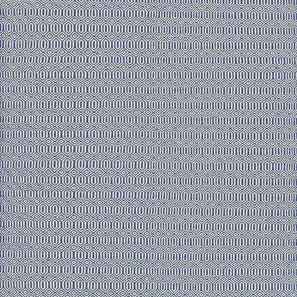 Close-up repeating pattern of navy hexagons outlined in ivory, featured on the Couristan Cottages Indoor/Outdoor Rug - Southport/Navy