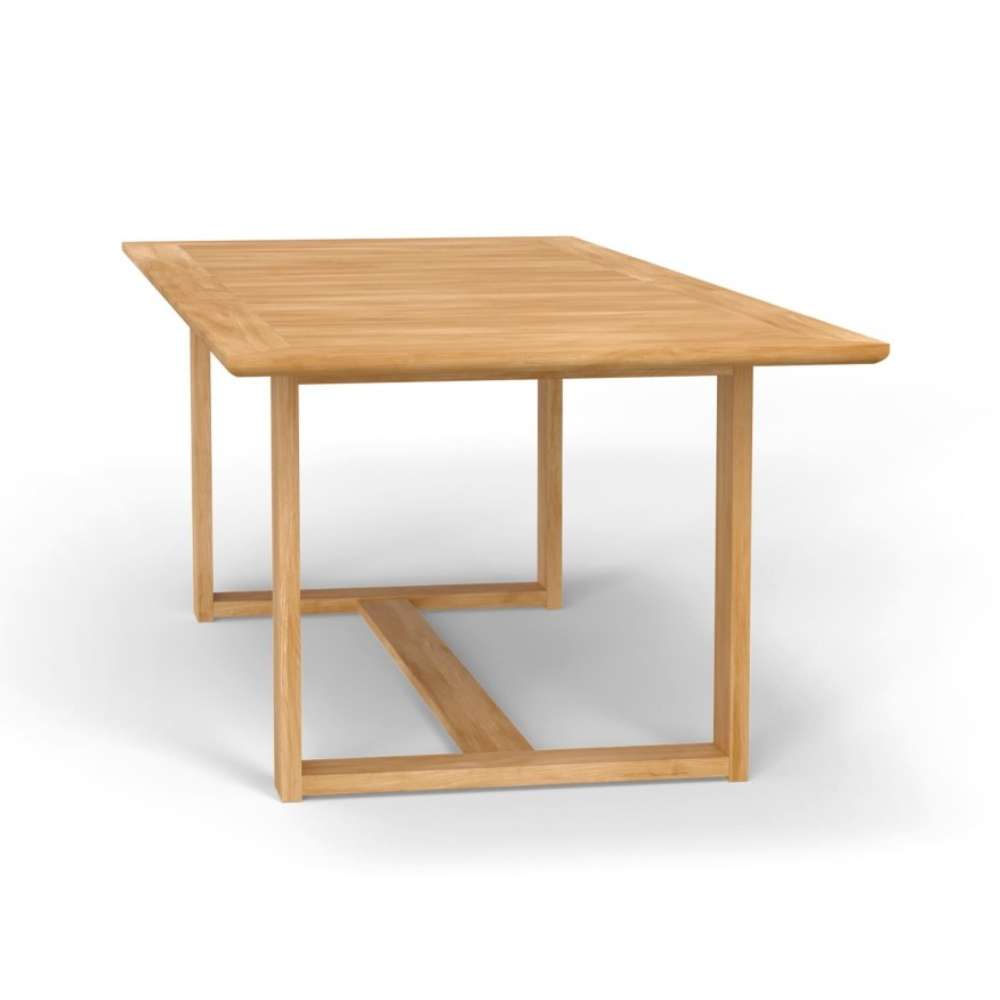 Corner angle view shows the solid teak construction and support frame underneath the Westminster Teak Horizon Teak Table