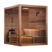 Corner view of Golden Designs Kuusamo 6 Person Traditional Sauna where two glass walls meet, showing an L-shaped bench and the guarded stove inside