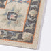 Corner edge of Momeni Anatolia Indoor Rug - ANA-8 Charcoal displays its clean finish and intricate border design