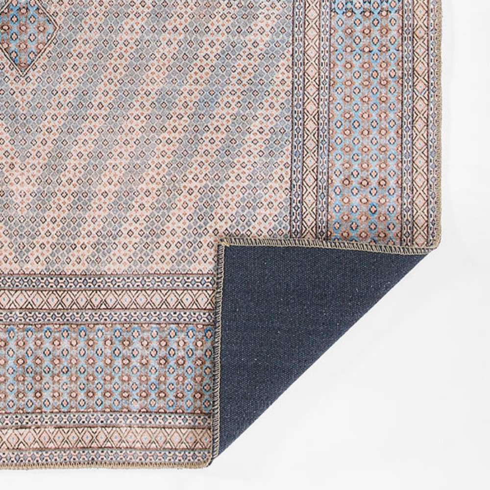 Corner flip of Momeni Afshar Indoor Rug - AFS34 Blue reveals its sturdy backing