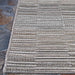 Couristan Cape Indoor/Outdoor Rug - Fayston/Silver-Charcoal is displayed flat on stone flooring, showing off its horizontal stripe pattern and neatly finished edge