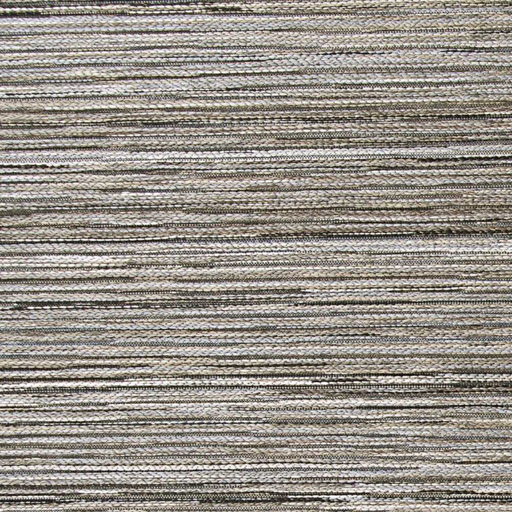 Couristan Cape Indoor/Outdoor Rug - Hinsdale/Light Brown-Silver is spread out on a stone patio