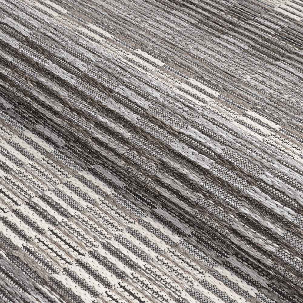 Couristan Cape Indoor/Outdoor Rug - Torrent/Sky Blue-Grey showcases its finely woven texture in a close-up shot, revealing its durability and detail