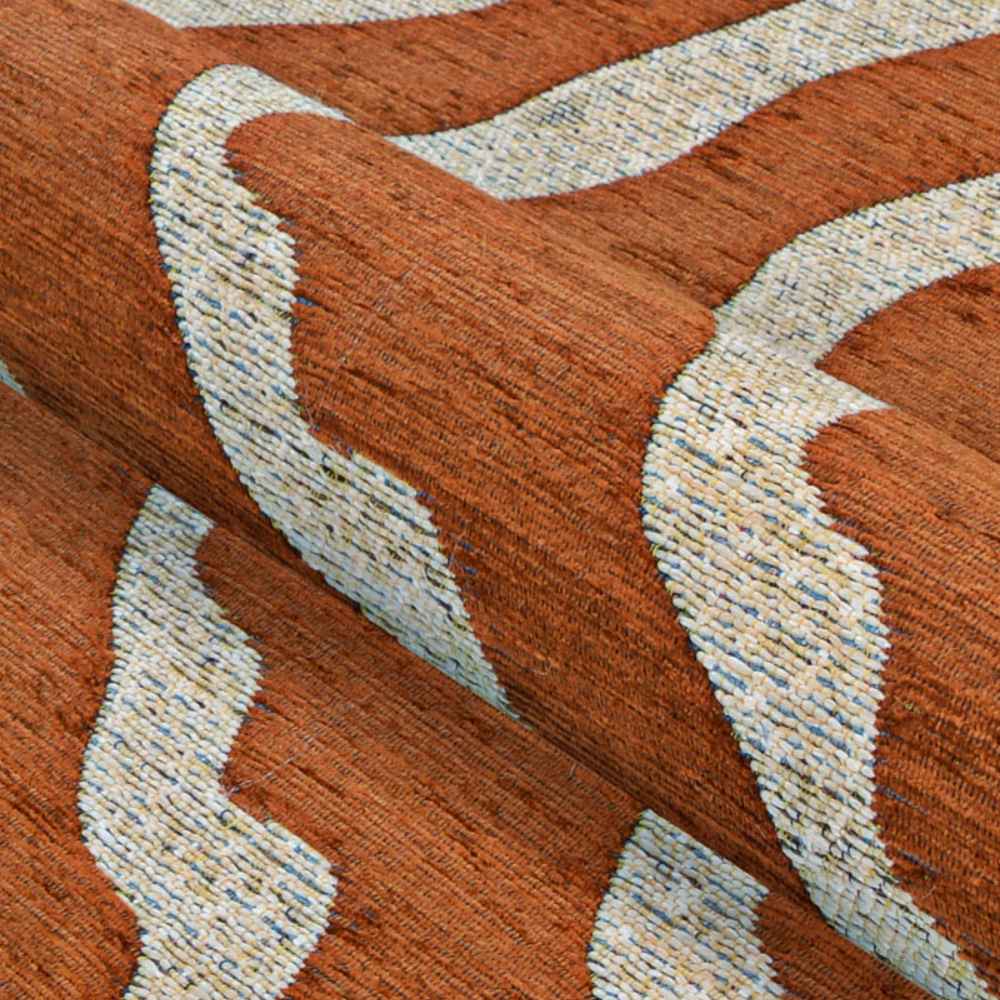 Couristan Castille Indoor/Outdoor Rug - Fiore/Terra-Cotta is shown rolled to highlight its thick texture and durable weave in terracotta and beige