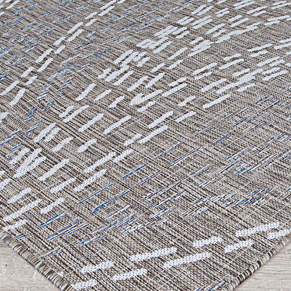 Couristan Charm Indoor/Outdoor Rug - Aurora/Twig lays flat on the floor