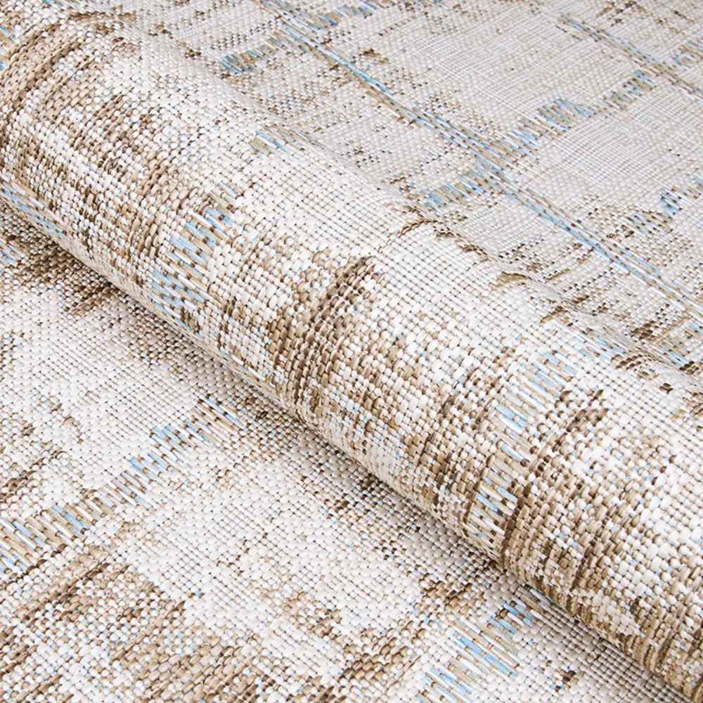Couristan Charm Indoor/Outdoor Rug - Tiverton/Sand-Ivory shows the rug partially rolled up